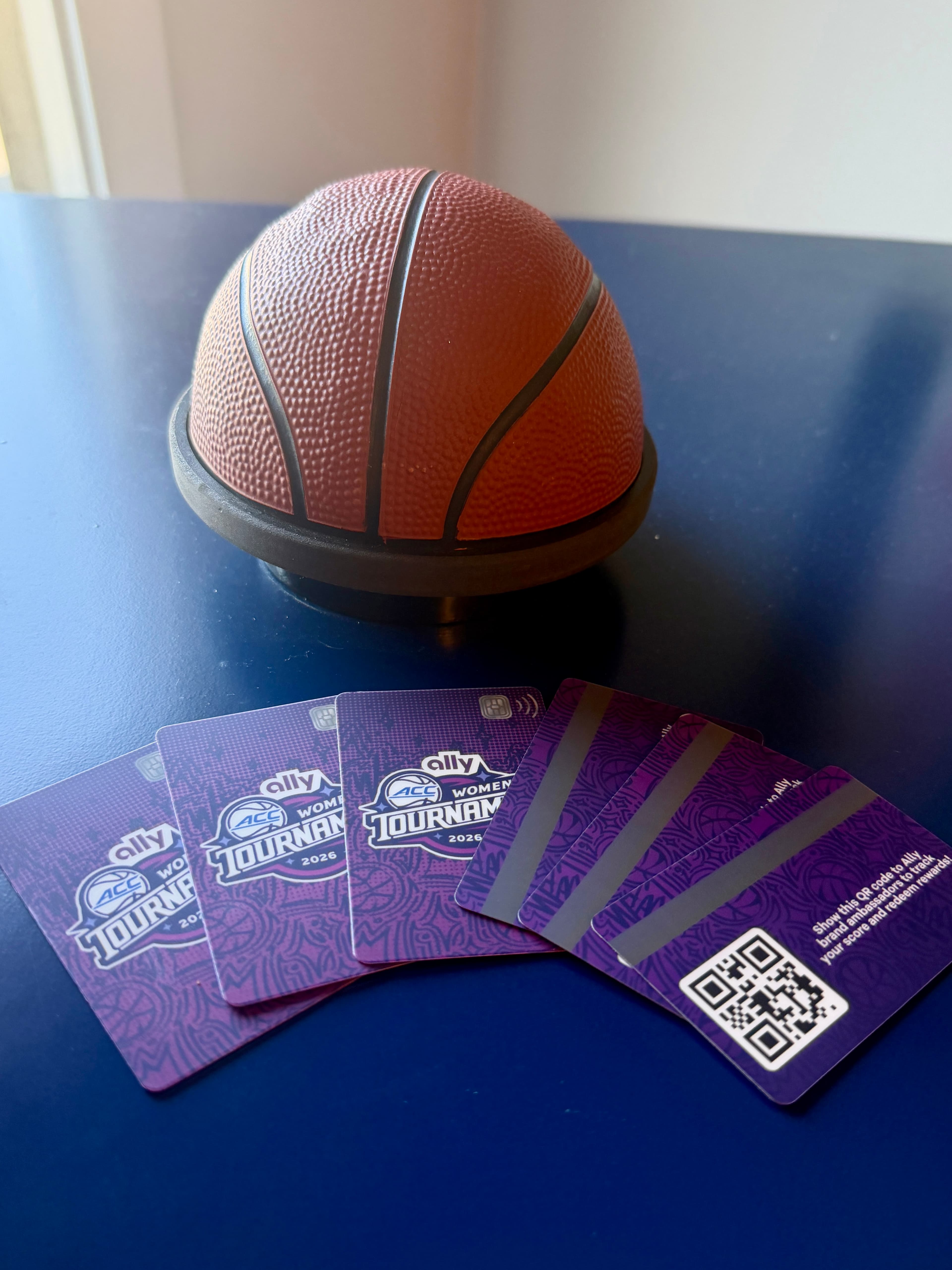 Ally branded registration card and check-in station at the ACC Women's Tournament