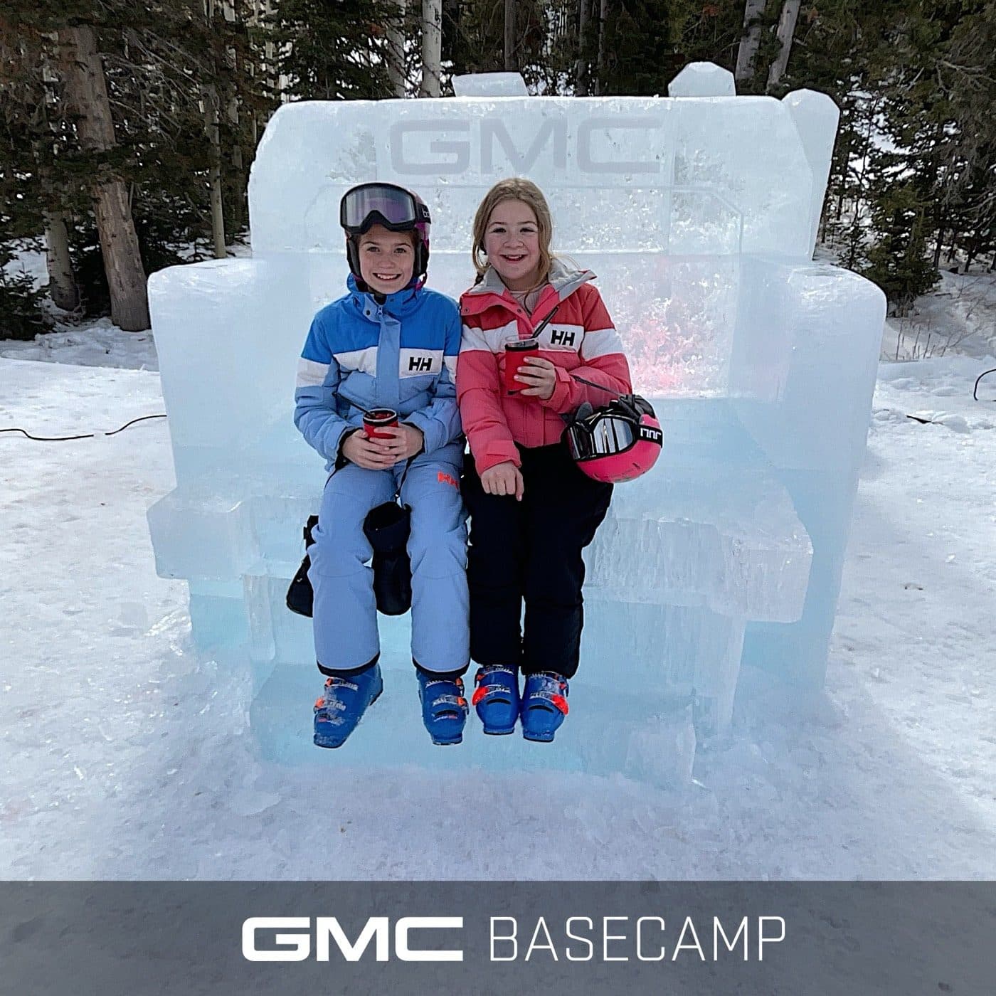 GMC Basecamp Selfie Station beside an ice truck at an outdoor activation