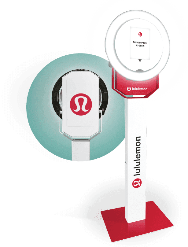 The Selfie Station branded photo booth: a ring-light kiosk with a full-wrap column, shown from the front and the back